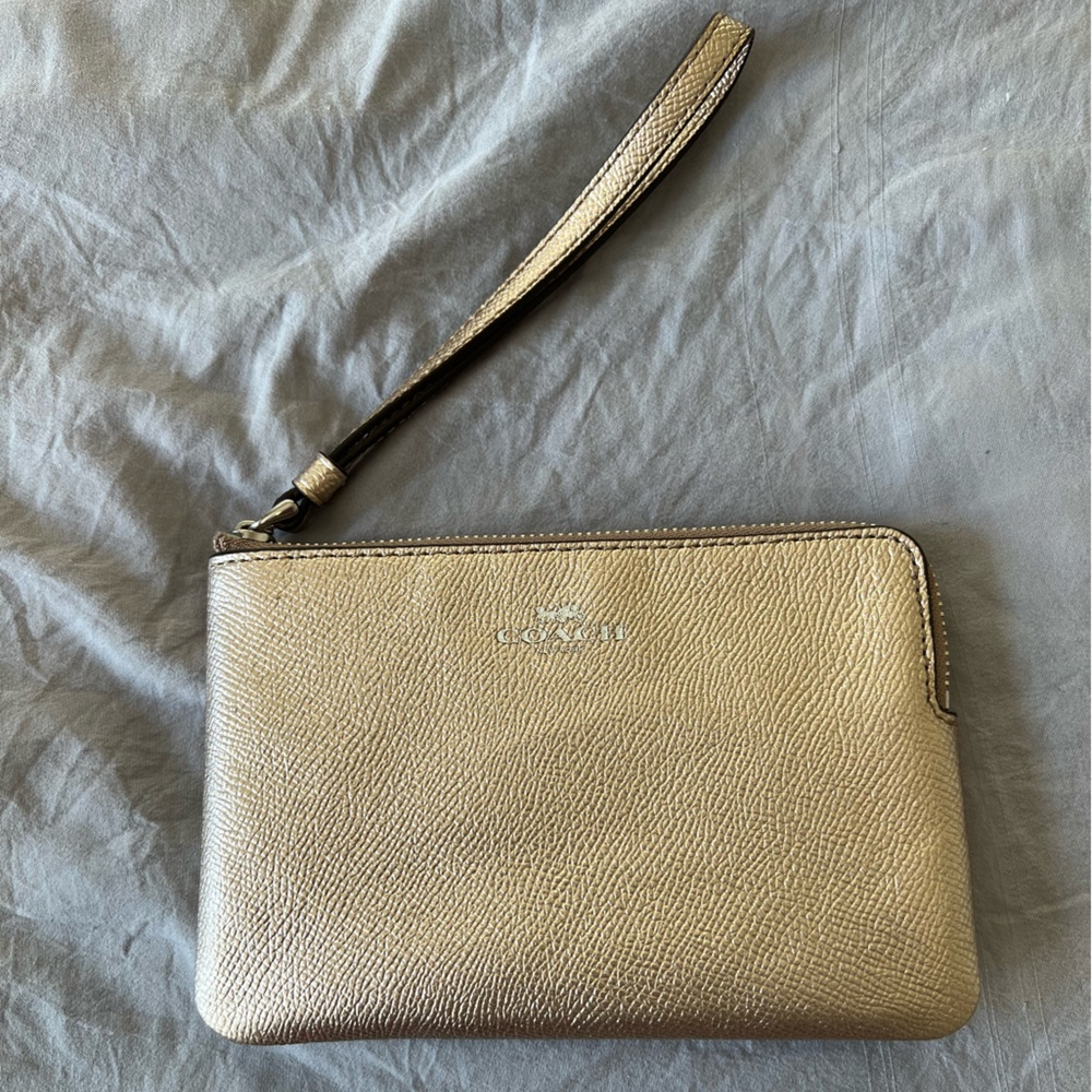 Coach wristlet. Rose gold